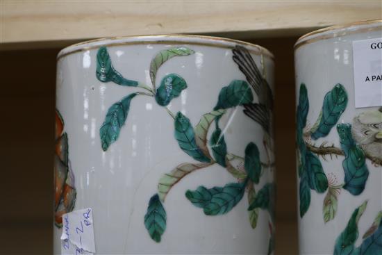 A pair of Chinese famille rose cylindrical vases, Tongzhi mark and period H.31cm